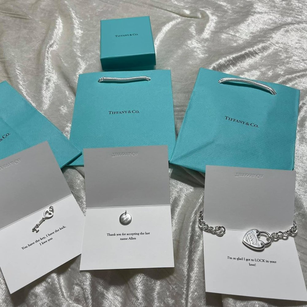 Tiffany & Co. charm bracelet w/ 2 charms
